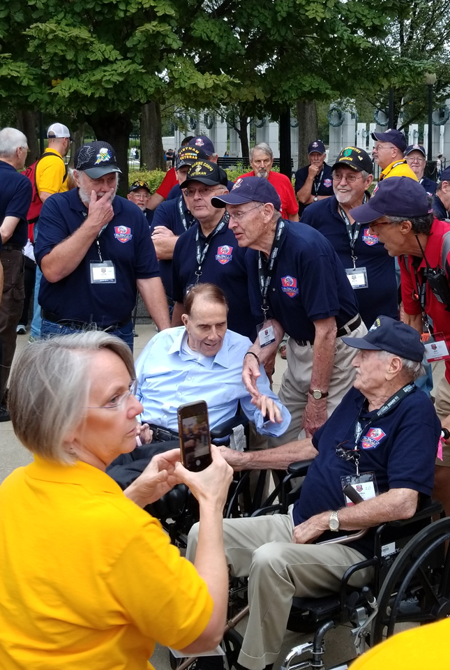 Senator Dole greets us